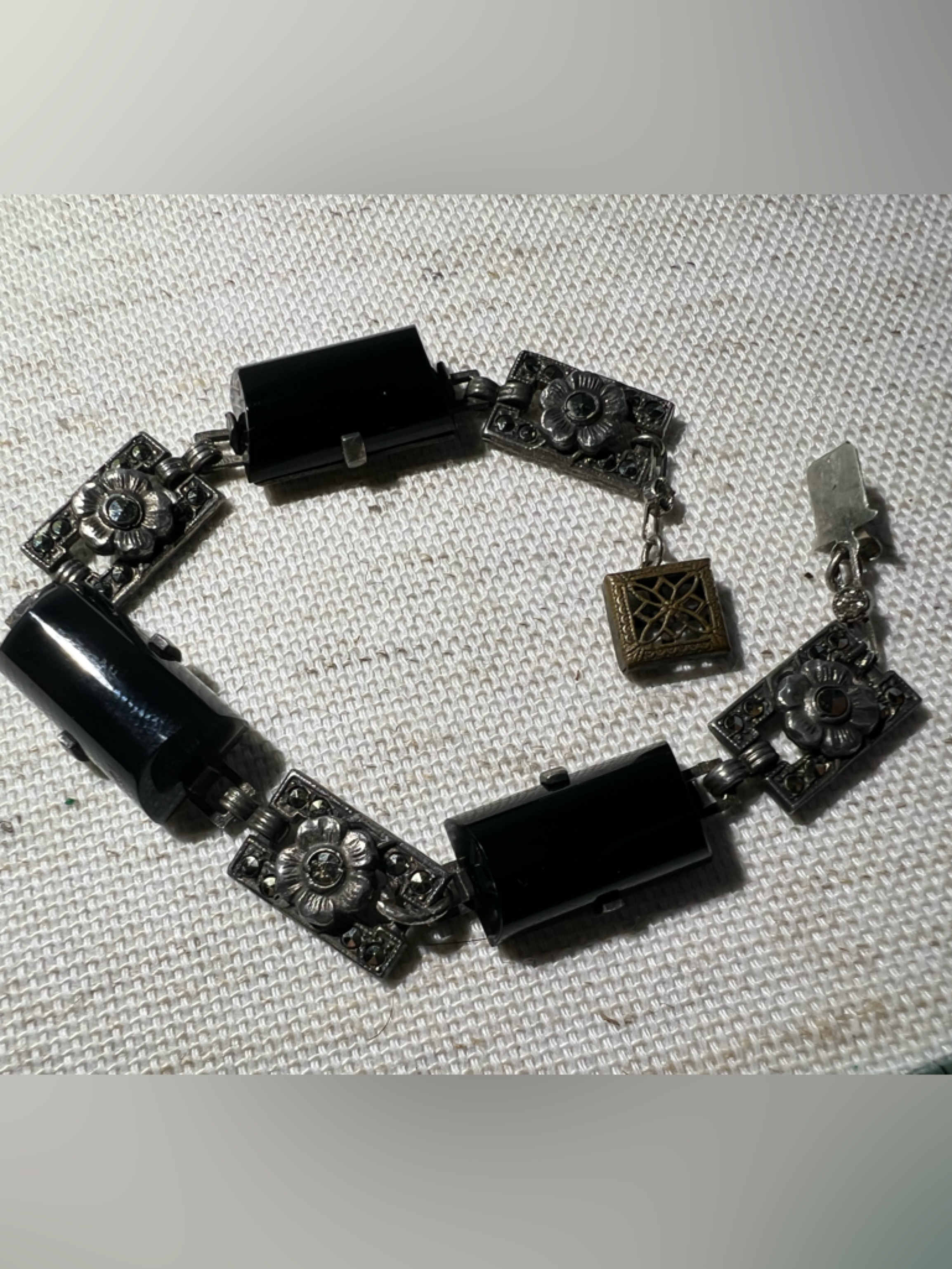 Black Rectangular Stone Link Bracelet With Silver Floral Accents
